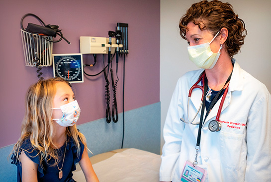 Dr. Crossen with young diabetes patient