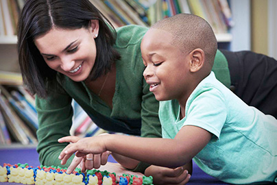 patient care provider with child.