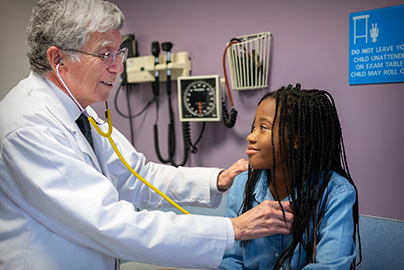 Young patient getting a check-up with endocrinologist