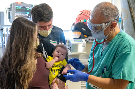 Satyan with family and infant