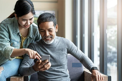 couple checking smart phone