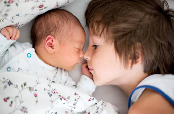 baby with brother, stock image for clinical studies