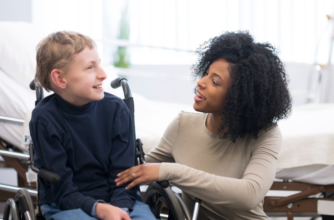 Image of a care provider and a patient 