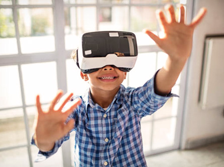 kid wearing virtual reality goggles
