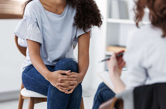 A young girl in a therapy session