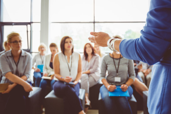 A speaker talking to an audience