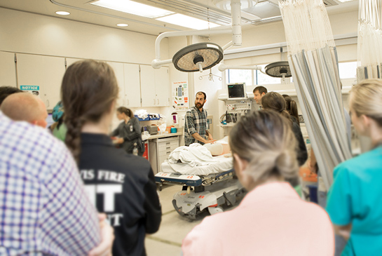 A medical team simulating procedures in their operating room.