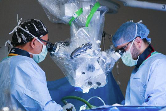 Orthopaedic Surgeons working on a spine surgery