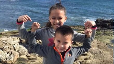 A brother and sister on the beach