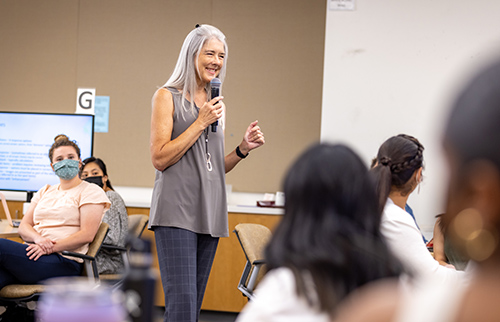 Shana Ruggenberg, the director of the Mater’s Entry Program in Nursing, leads a classroom discussion with students.