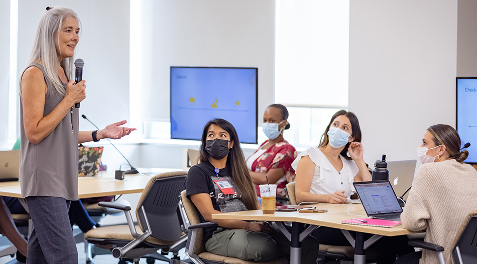 Shana Ruggenberg, the director of the Mater’s Entry Program in Nursing, leads a classroom discussion with students.