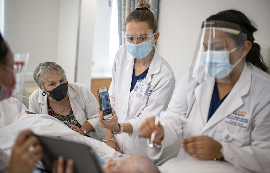 Assistant Professor Laura Van Auker guides family nurse practitioner students