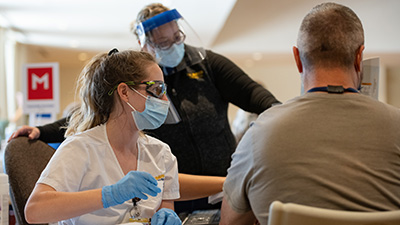 nursing students provide vaccinations