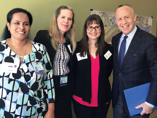 Sacramento Mayor Darrell Steinberg, right, met with students Mini George and Kerri Maya along with Wellspring’s Genelle Smith.