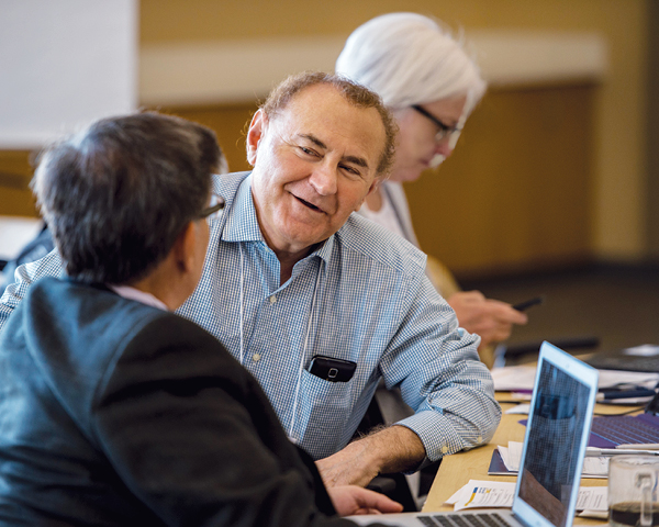 Top, more than 50 experts lend their perspectives to identify areas of need and develop research priorities. Below, Peter Vitaliano, a professor at the University of Washington Center for Studies in Demography and Ecology, shares his expertise on the relationship between stress and health for caregivers.