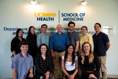 Leach Lab photo taken in April 2024 in front of the Oak Park research building Orthopaedic Surgery department sign