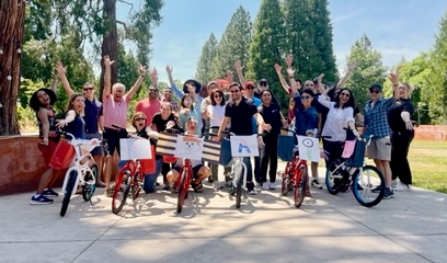 group of people with bicycles