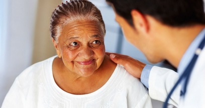 doctor consults with patient