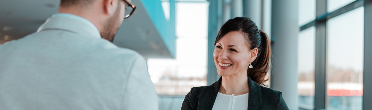 Two people shaking hands. (C) Adobe Stock. All rights reserved. 