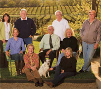 PHOTO — Board of Directors left to right, back row: Brenda Ristrom, John Mills, Gary Little, Loren Fasmer; middle row: Jago Landgraf, Hal Jones, Marylou Fasmer; front row: Shirley Jones, Frankie the dog, Cathy Landgraf (not present: Stephen Honeychurch). Copyright 2009 UC Regents.