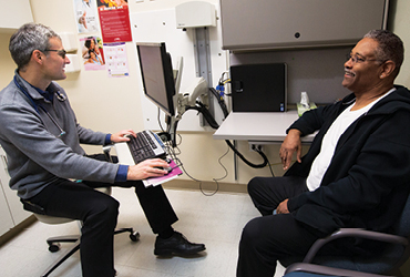 Scott McDonald with patient