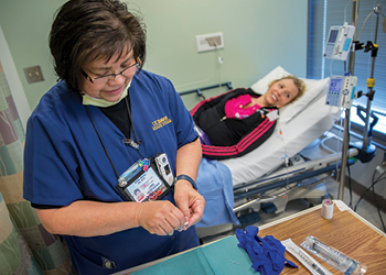 Gilda Abria, clinical resource nurse, and Victoria Pouchés