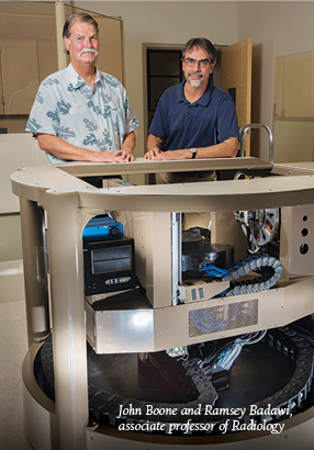 John Boone and Ramsey Badawi, associate professor of Radiology