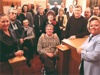 PHOTO — It takes a village: Members of the Auburn Community Cancer Endowment Fund gather at the Placer County Department of Museums. Virgil Traynor is standing in the foreground, third man from the right.