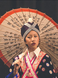 PHOTO — Hmong dancers performed in traditional dress at the Asian American Cancer Control Academy.