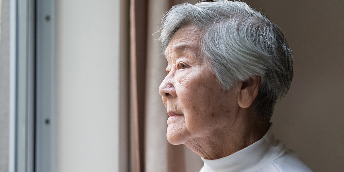 Asian American woman looking to the left